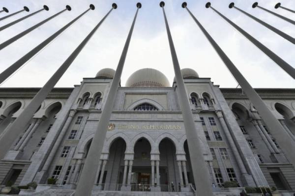 Driver escapes gallows, but jailed 13 years for drug possession